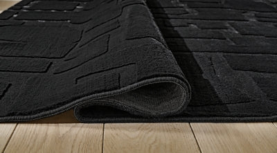 Gibbswell Washable 5' x 7' Area Rug - House Of Furniture/Allan's Gallery